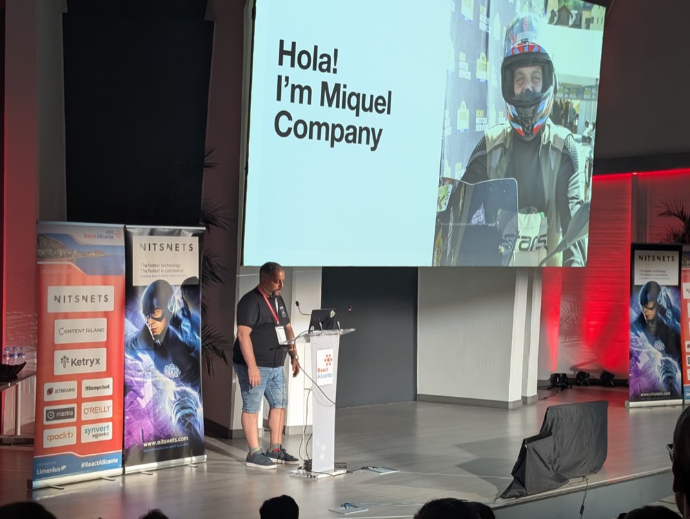 Miquel Company introducing himself on stage, 2025