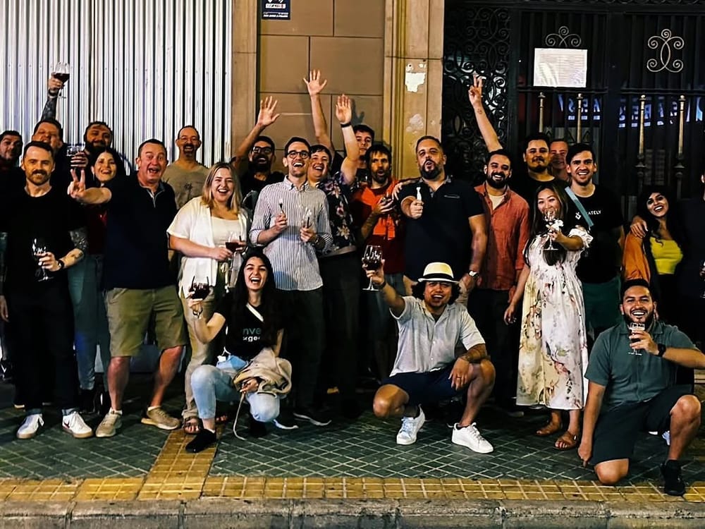 Speakers and attendees celebrating at night in Alicante, 2024