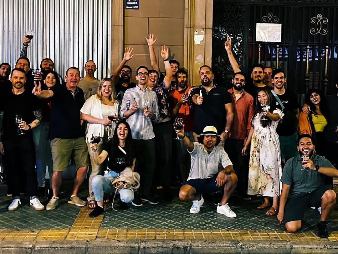 Speakers and attendees celebrating at night in Alicante, 2024