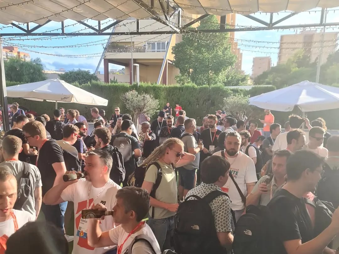 Attendees networking on the terrace, 2024