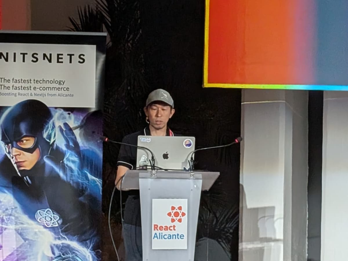 Daishi Kato at the lectern, React Alicante 2025
